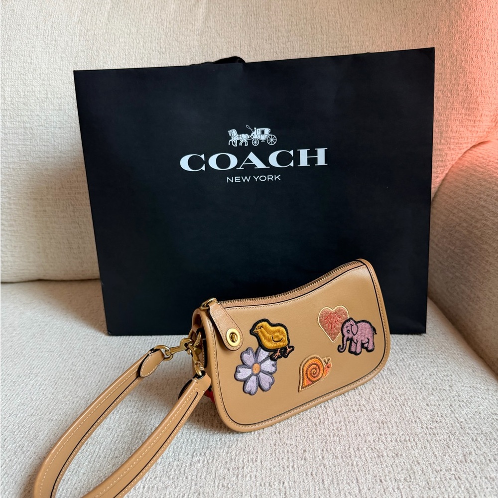 Coach Tan Wristlet with Playful Embroidery